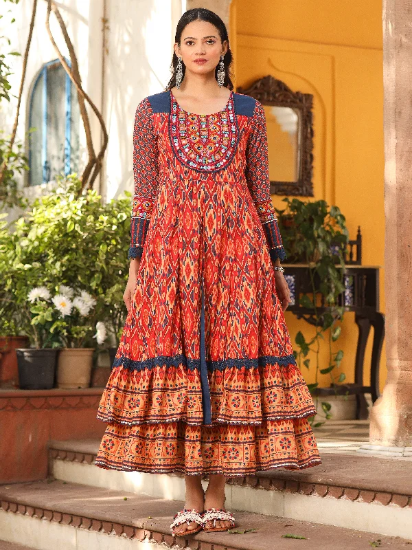 Eclectic Fashion Juniper Rust Cotton Ikat Printed Layered Maxi Dress With Thread Embroidery & Dori Tassel Tie-Up At Waist