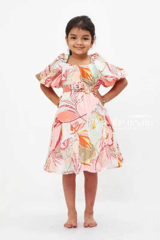 Women Wear Online Tropical Sunset Puff Sleeve Dress: Girls' Colorful Botanical Print Frock with Rose Detail Women Wear Online Tropical Sunset Puff Sleeve Dress: Girls' Colorful Botanical Print Frock with Rose Detail