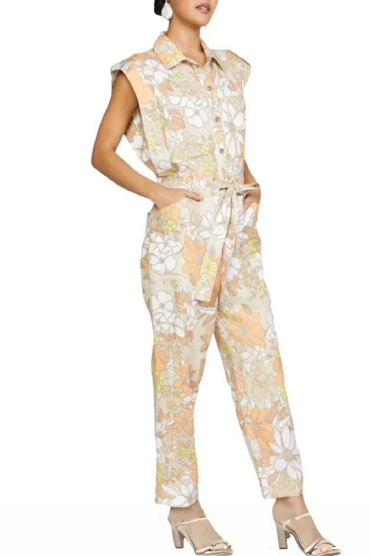 Timeless Elegance Sleeveless Utility Button Down Jumpsuit In Floral Sand