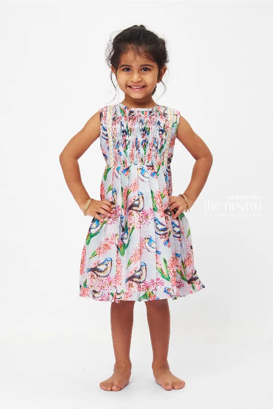 Season Sale Serenade of Spring Dress: Sleeveless Bird & Bloom Print Frock for Girls Season Sale Serenade of Spring Dress: Sleeveless Bird & Bloom Print Frock for Girls