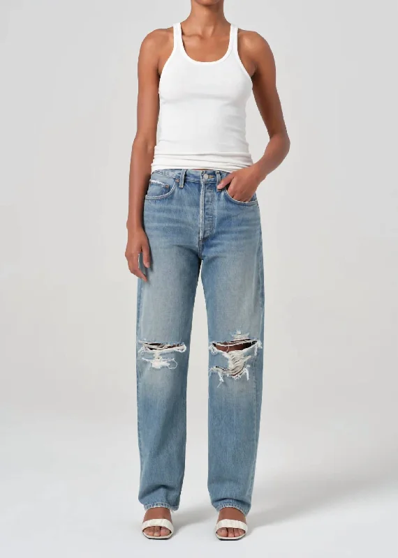 Online Boutique Clothing Kelly Ripped Faded Jean In Backdrop